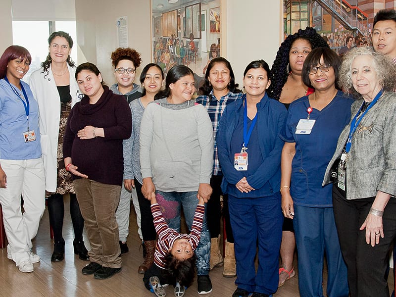 Jessica Lynn with patients and colleagues