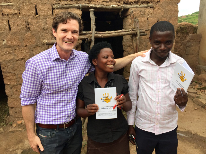 Jason Baker with patients in Uganda