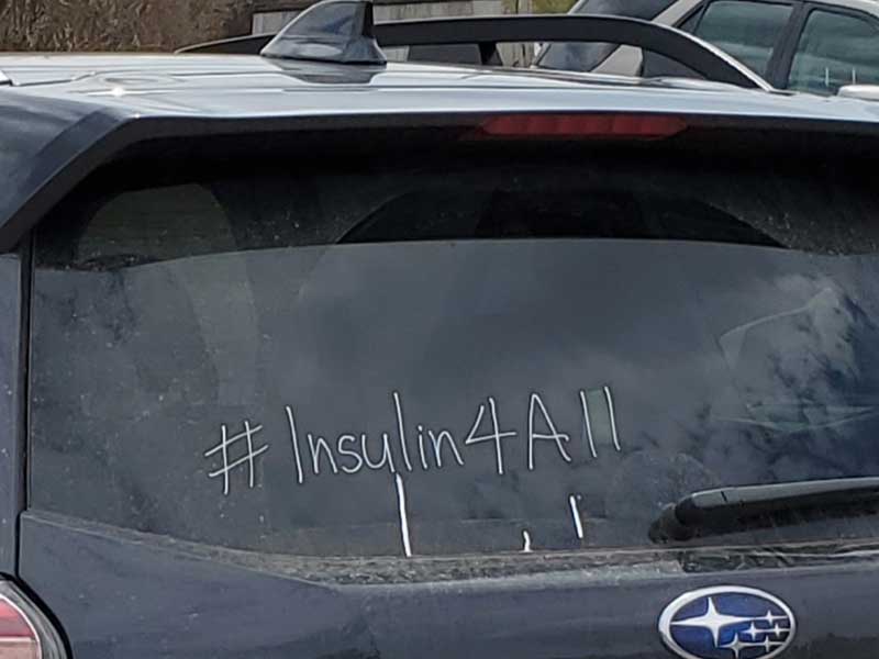 Car with the campaign hashtag #insulin4all