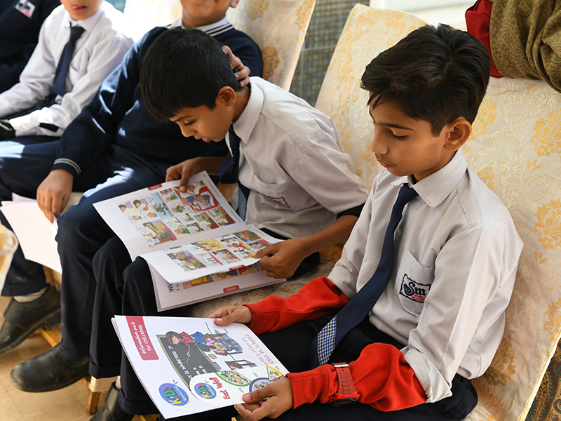 Children in India using the KiDS educational resources
